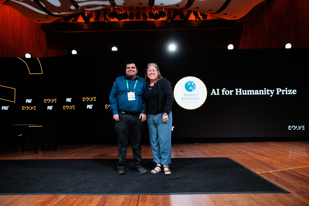 Kartik Sawhney accepting the AI for Humanity Prize at MIT Solve